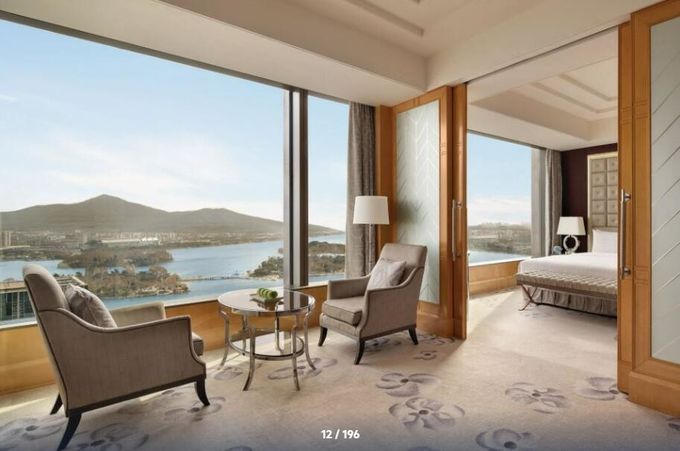 aktueller Firmenfall über Shangri-La: Anmutiges 5-Sterne-Hotel mit eleganten Zimmern und epischem Stadtblick  4